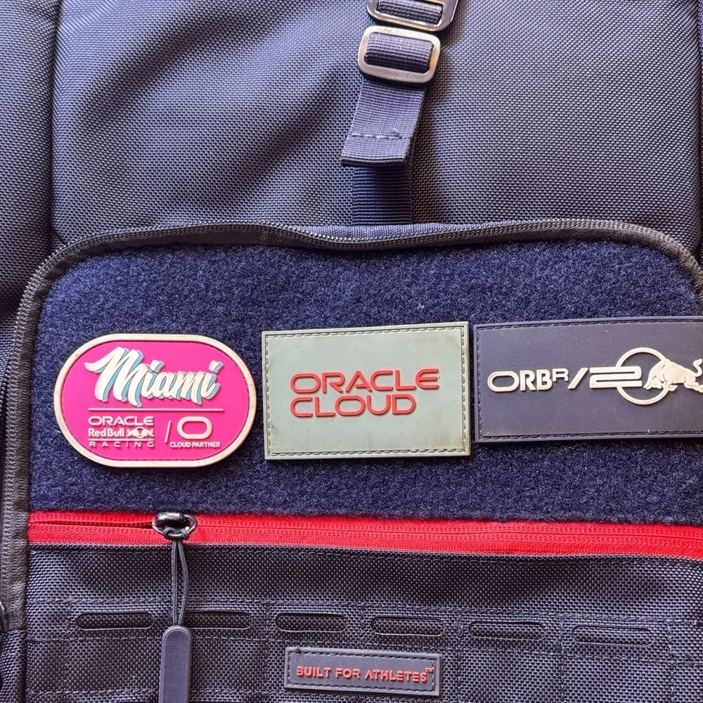 Oracle Red Bull Racing Formula F1 Roll Top Backpack with 3 Removable Patches